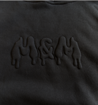 Czarna bluza oversize z wytłaczanym logo M&M